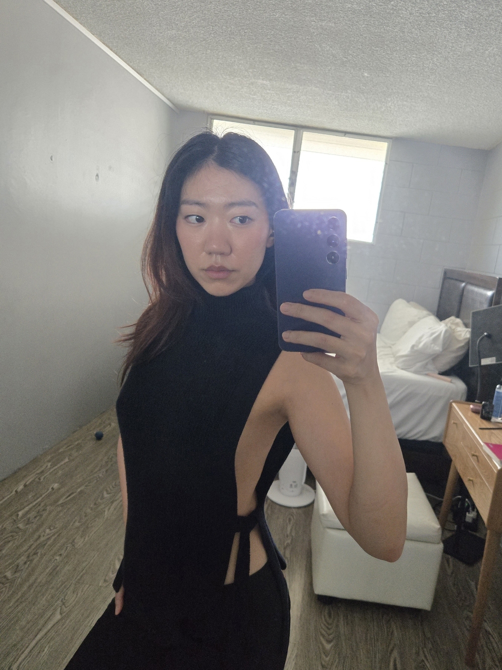 Sleeveless Black Side-Tie Turtle Neck Top